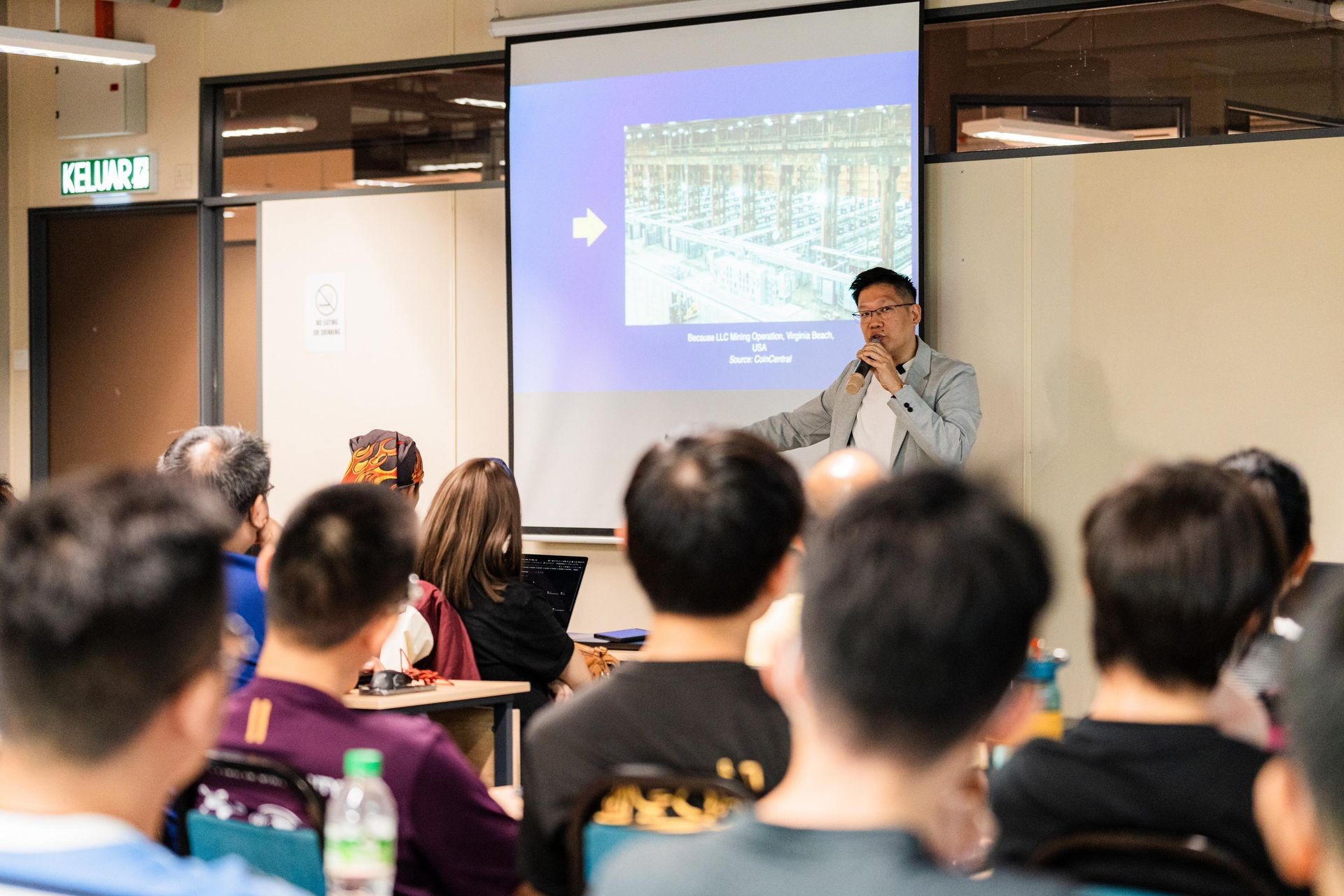 Jason Chew conducting a Bitcoin class with practical activities